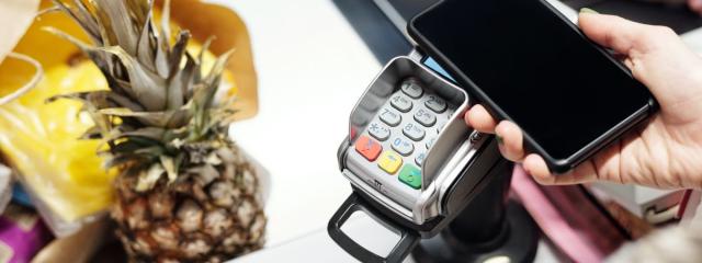 Person making payment at cash register