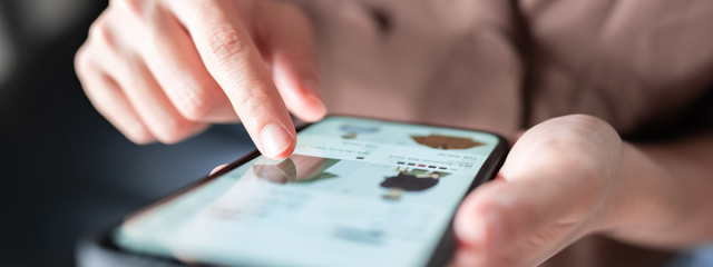 Person making an online purchase using a smart phone