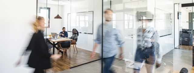People in a bright office setting